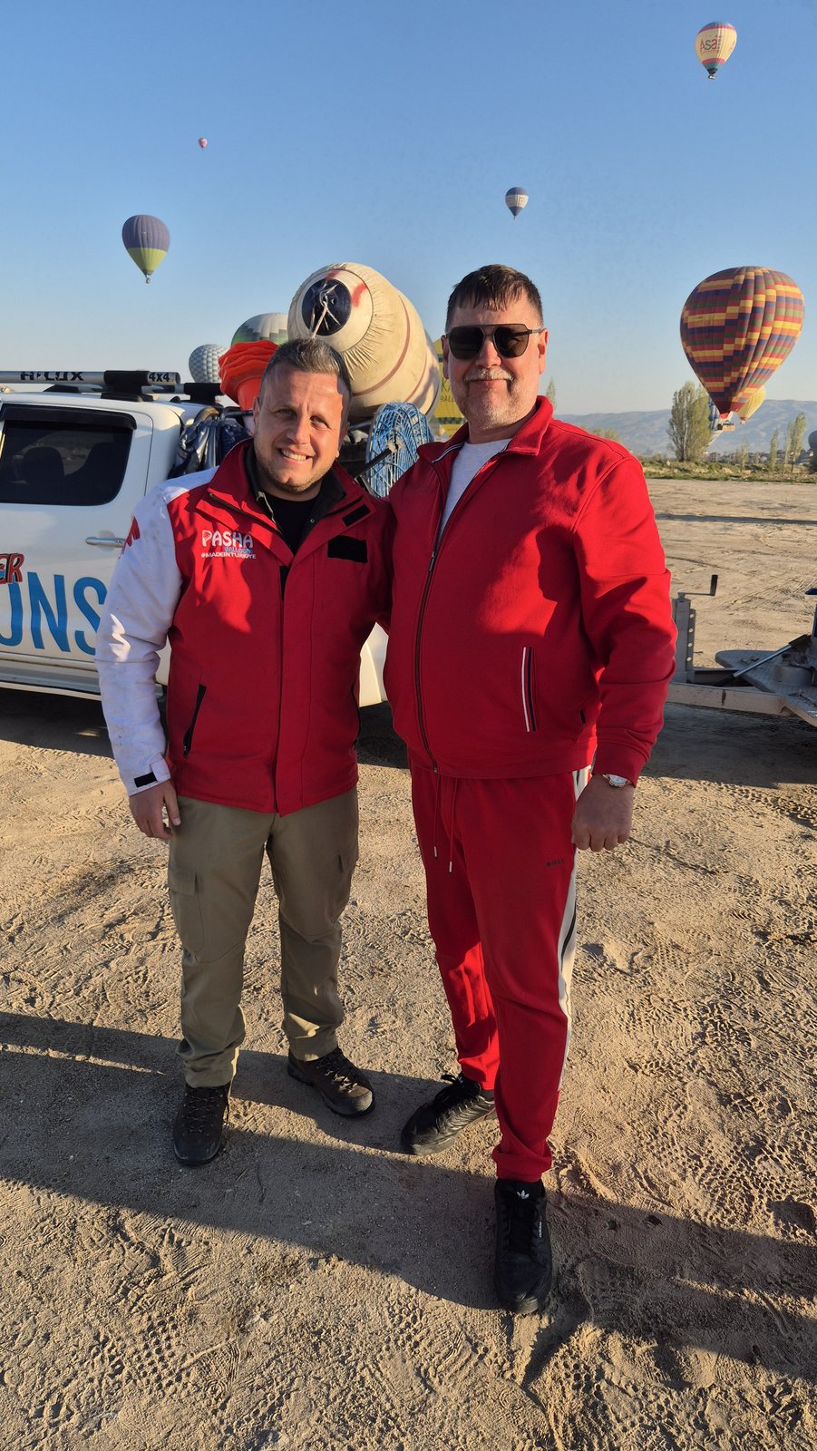 Guests at the balloon launch site at sunrise