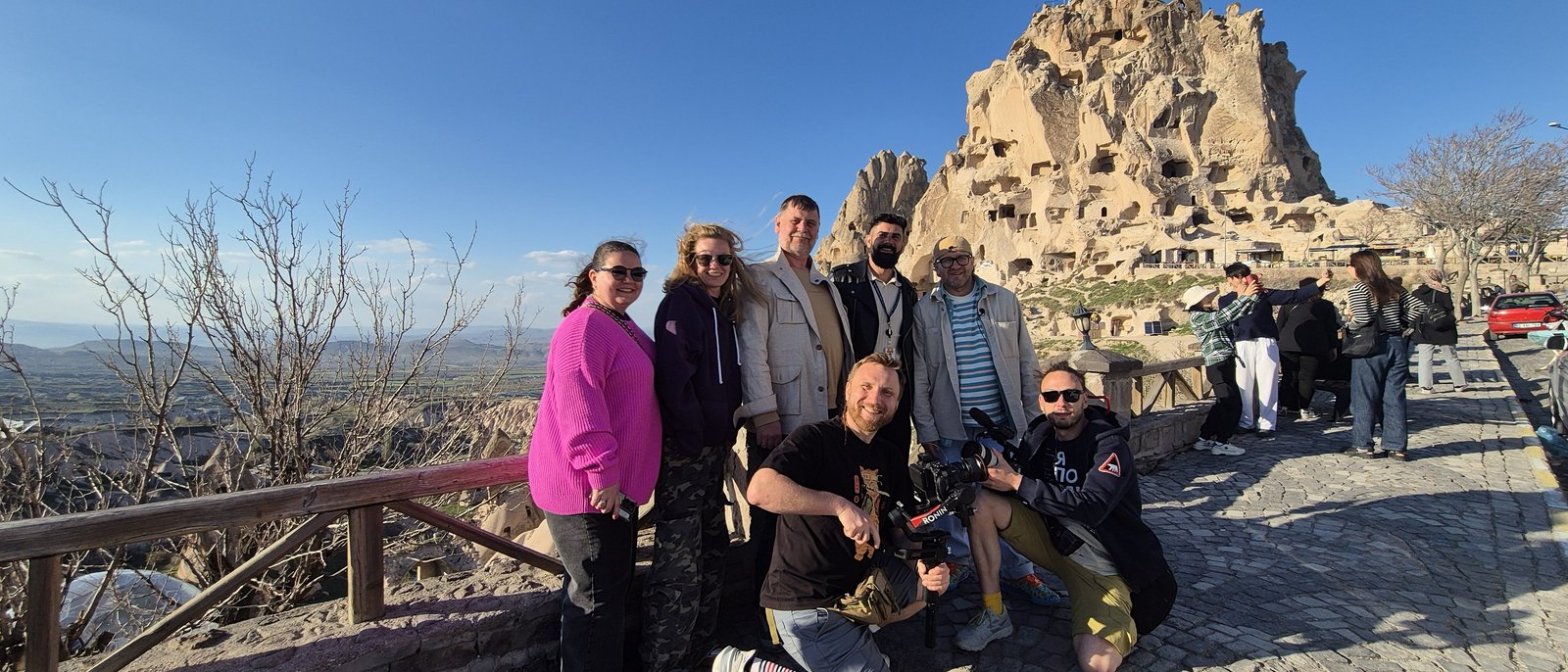 Guests with our team in front of Uçhisar Castle, Cappadocia